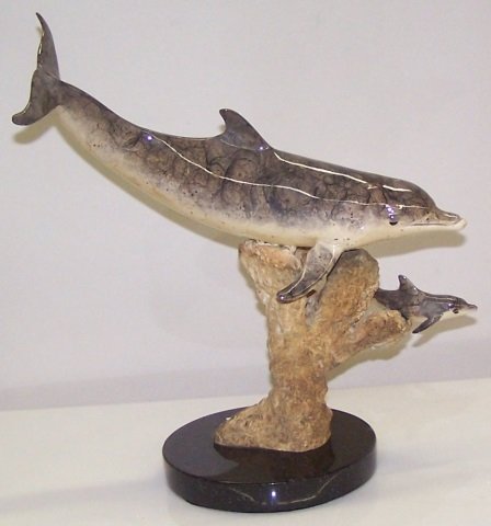 *WYLAND, ROBERT: "Dolphin and Calf", bronze sculpture, signed and numbered AP 3/95, approximate height 11 5/8".