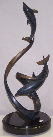 *HANSON, SCOTT: "UP & AWAY", bronze sculpture, signed and numbered 07/150, on revolving marble base, approximate height 23 1/2".