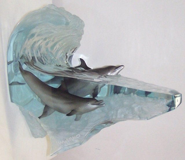 *WYLAND, ROBERT: "Surf Rider", lucite and pewter sculpture, signed and numbered 229/1500, approximate height 10 1/2", width 13 7/8", depth 10 1/2".