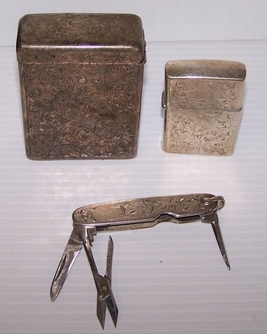 *3 PIECES OF STERLING SILVER: Pocket knife, cigarette case and lighter, approximately 5.56 troy ounces. D3