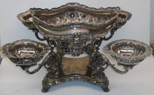 GORHAM STERLING SILVER EPERGNE: Epergne with oval center bowl raised on 4 scrolled legs, repouss‚ floral and scroll decoration, supporting 4 scrolled arms with attached squared removable bowls, raised on shaped rectangular