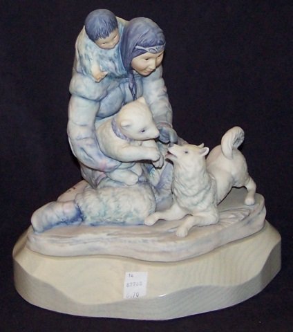 *CYBIS PORCELAIN FIGURE: Indian woman and child with bear and wolf, signed "Cybis #17", raised on white wood base, approximate figure height 9", with base 10 1/2". D3