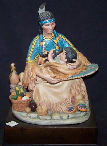 *CYBIS PORCELAIN FIGURAL GROUP: Shoshone "Sacajawea" #101, raised on hardwood base, approximate figure height 10 1/2", with base 12 1/2". D3