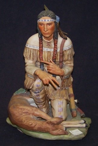 *CYBIS PORCELAIN FIGURE: Onondaga "Hiawatha" #13, raised on wood stand, approximate figure height 10 1/2", with stand 12 1/2". D3