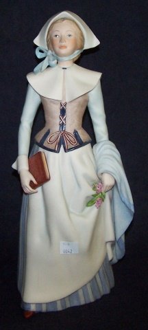 *CYBIS PORCELAIN FIGURE: Lady holding book, marked "Cybis #73", approximate height 14". D3