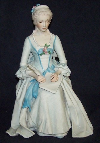 *CYBIS PORCELAIN FIGURE: Seated lady writing with feathered pen, marked "Cybis #148", approximate height 10". D3