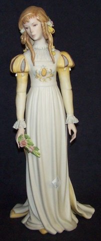 *CYBIS PORCELAIN FIGURE: Girl holding floral bouquet, marked "Cybis #7", approximate height 13". D3