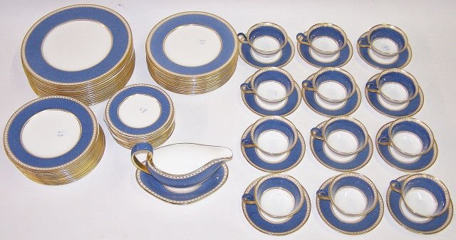 SET OF WEDGWOOD DINNERWARE: 13 dinner plates, 12 salad plates, 12 bread and butter plates, 12 dessert plates, 12 coffee cups, 12 saucers and sauceboat with undertray. D3