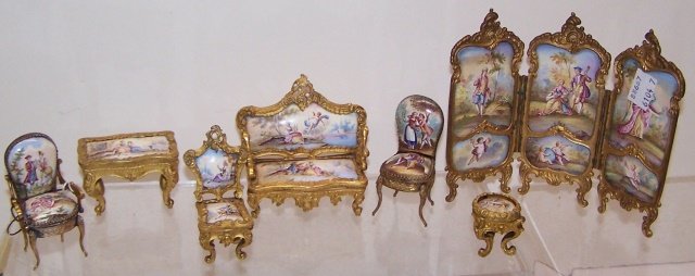 *7 PIECE LIMOGES MINIATURE PARLOR SET: Having brass frames and enameled panels, comprising settee, approximate height 3", armchair, height 2 3/4", 2 side chairs, height 2 3/4" and 2 1/2", 3-fold screen, height 5", bureau plat, height 1 3/4
