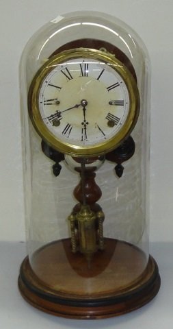19TH C. MANTEL CLOCK: Fitted with time and strike movement, the enamel dial having Roman numeral markers, enclosed under dome, marked on underside "The Crystal Palace Clocks", approximate height 18".