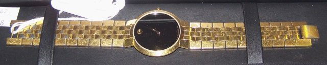 *MOVADO WRISTWATCH: Complete with original case.