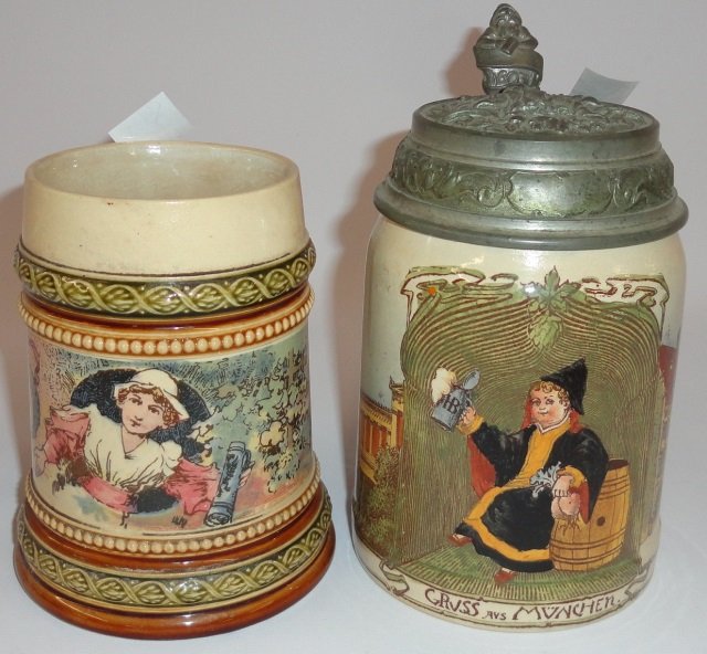 *2 METTLACH POTTERY STEINS: 1 having pewter lid decorated with "Welcome to Munich Child", marked on underside "Villeroy & Boch, Mettlach Dec 1174 #1526", approximate height 6 1/2", 1 decorated with girl with tankard and grapevin