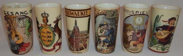 *6 METTLACH POTTERY BEAKERS: Milwaukee City Hall, marked on underside 232, figures playing cards, 2327, gentlemen playing dice, 2327, 2 gentleman playing mandolin and heraldic lions, approximate height 5".
