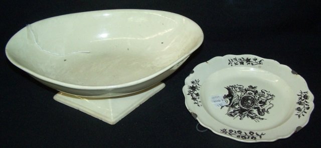 *2 PIECES OF ENGLISH CREAMWARE PORCELAIN: Oval footed bowl and plate, plate has piecrust rim decorated with crest and reading "For Our Country", approximate diameter 8 1/8", and footed bowl, length 11 1/2".