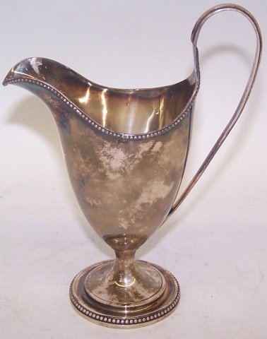 *ENGLISH STERLING SILVER CREAMER: With London hallmarks, approximate height 6", approximately 3 troy ounces.