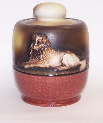 *NORITAKE HANDPAINTED PORCELAIN HUMIDOR: Having relief decoration of dog, approximate height 5 1/2".