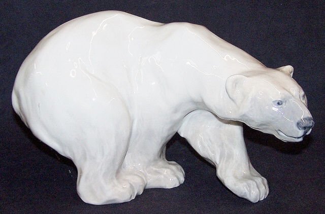 ROYAL COPENHAGEN PORCELAIN FIGURE: Polar bear, approximate length 10", height 5 1/2".