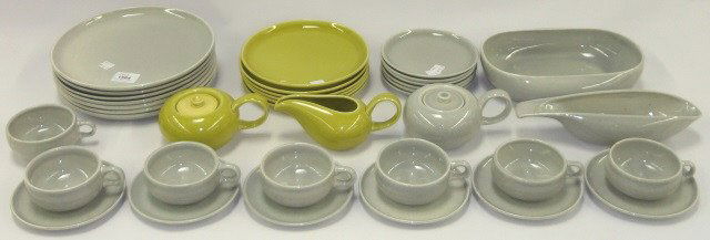 *SET OF RUSSEL WRIGHT DINNERWARE: 6 dinner plates, approximate diameter 10", 5 salad plates, diameter 8", 6 bread plates, diameter 6", 7 coffee cups, 6 saucers, sauceboat, oval bowl, creamer and 2 sugars.