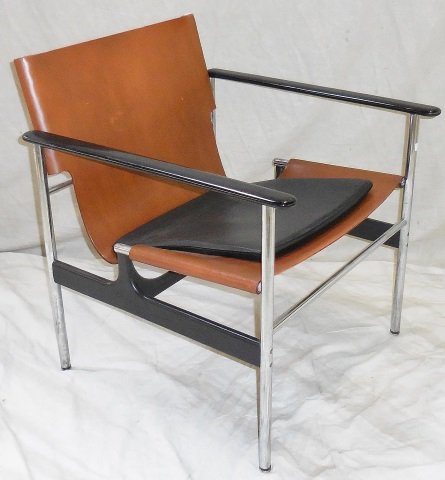 CHARLES POLLOCK SLING CHAIR: For Knoll, having chrome frame and brown upholstery.