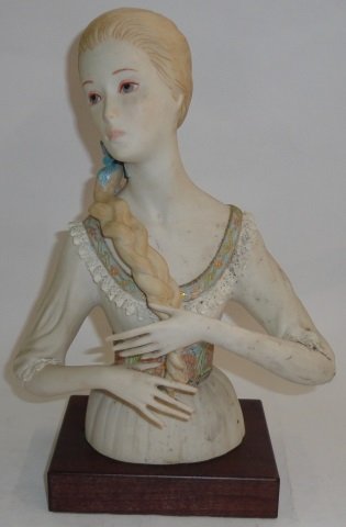 *CYBIS PORCELAIN FIGURE: Young girl with long braid, mounted to wood stand, approximate height with stand 11".
