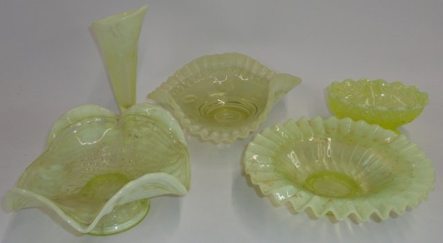 *5 PIECES OF VASELINE GLASS: Footed oval bowl, approximate height 2 1/2", 3 bowls with shaped borders, diameter 7 1/2"- 8", and footed vase, height 7".
