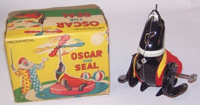 *MECHANICAL WIND-UP TOY: Oscar the Seal, with original box.