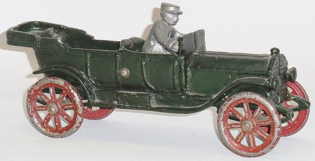 *CAST IRON TOURING CAR: Unmarked, possibly A.C. Williams, includes nickel plated driver figure and painted passenger figures, approximate length 9 1/2".