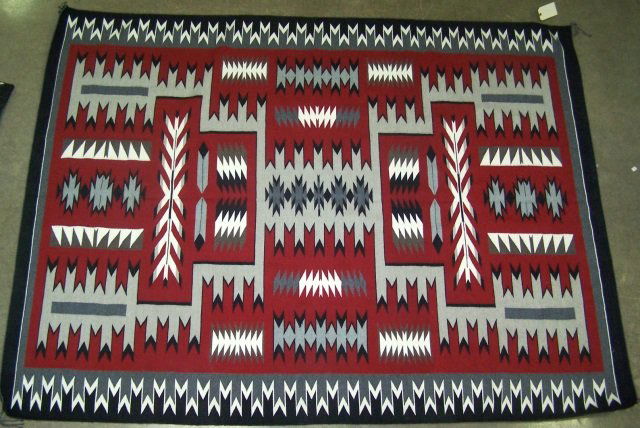 *NAVAJO RUG/WEAVING: "Storm pattern", with tag from Crown Point Rug Weavers Association, New Mexico, with weaver's name, approximate 8' x 6' 1".
