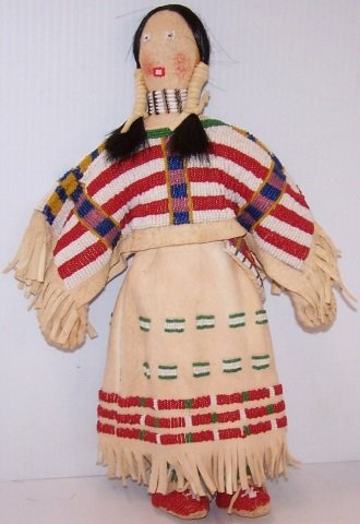 *NATIVE AMERICAN HIDE, CLOTH AND BEADED DOLL: Approximate height 12 3/4"