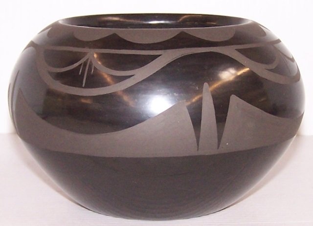 *SAN ILDEFONSO POTTERY BOWL: Black on black with geometric design, singed on bottom "Marvin and Frances Martinez, San Ildefonso", approximate height 3 3/4", diameter 6".