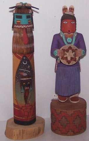 *2 CARVED AND PAINTED WOOD KACHINAS: Woman holding basket, signed "Herschel Talashoma, Jr.", approximate height 8 1/4", and "Hector Warrior Maiden", signed on bottom "Carlon Harvey, Hopi 97", height 8 1/2".