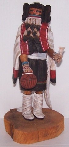 *CARVED AND PAINTED WOOD KACHINA: Woman holding pottery bowl, signed on bottom "Anna", approximate height 9".