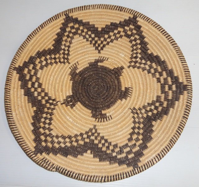 *APACHE COIL TRAY BASKET: Willow and devil's claw with turtle and star decoration, approximate diameter 11 1/8".
