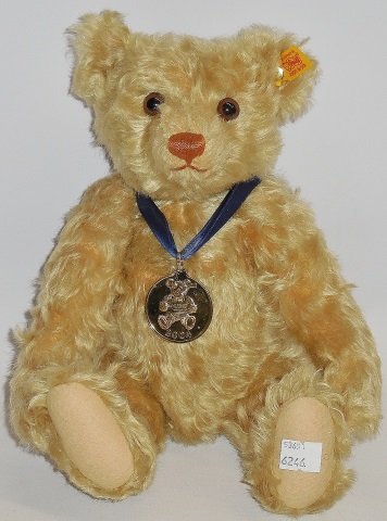 *STEIFF STUFFED TEDDY BEAR: Danbury Mint 2004 medal around neck, button and tag in ear, approximate seated height 9".