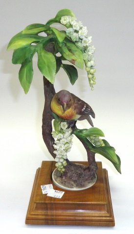 *ROYAL WORCESTER PORCELAIN FIGURAL GROUPING: "Lazuli Bunting (Passerina Amoena) with Choke Cherry", on wood stand, approximate height 11 1/2".