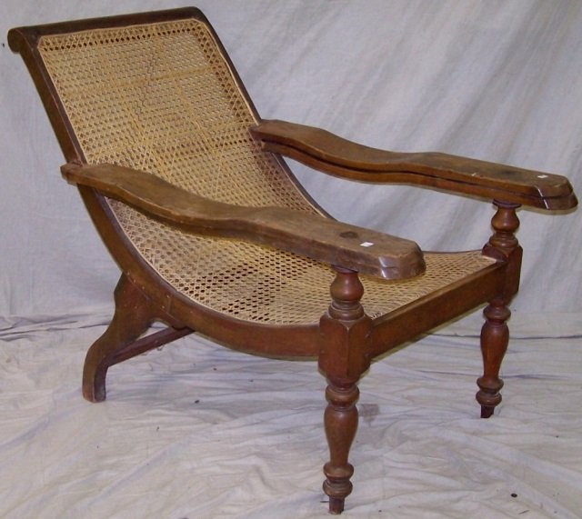 *DECK CHAIR: Having cane back and seat, approximate height 37", width 28 1/4", depth 49".