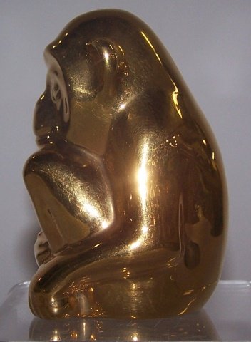 *ROOKWOOD ART POTTERY LIMITED EDITION FIGURE: "Golden Monkey" released in 1983, having 24 carat gold finish, the original design by Kataro Shirayamadani in 1928, marks include impressed Rookwood flame logo, numbered 122 of a limited edition of 25