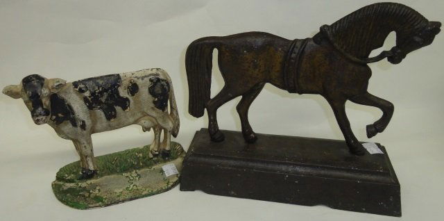 *2 CAST IRON DOORSTOPS (1 of 1)