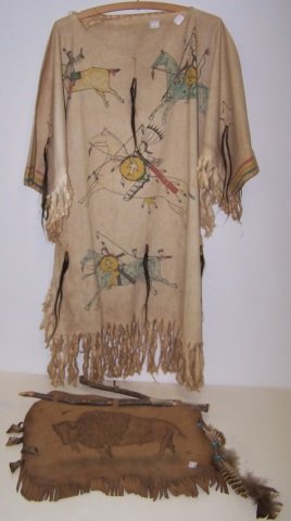 2 PIECES: Native American youth dress decorated with warriors on horseback and leather wall hanging decorated with bison and feathers.