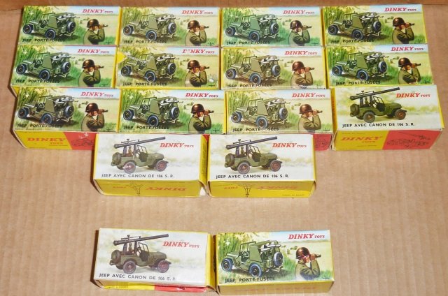 *GROUP OF DINKY DIECAST MODEL MILITARY JEEPS: 11 No. 828 rocket carrier jeep (1 missing rocket launcher) and 3 No. 829 gun carrier jeep (1 missing gun assembly), all in original boxes, includes 2 empty boxes of each.
