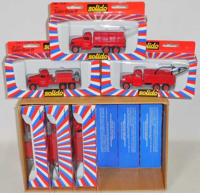 *18 SOLIDO DIECAST MODEL TRUCKS: 1:50 scale, 2 No. 3117 GMC Depanneuse, 2 No. 3113 GMC Tolee and 14 No. 3113 GMC Citerne Tole, all in original boxes.