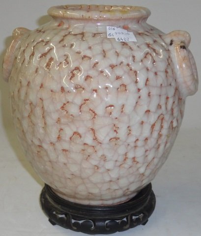 *ORIENTAL TERRACOTTA URN: Raised on hardwood stand, approximate height 9".