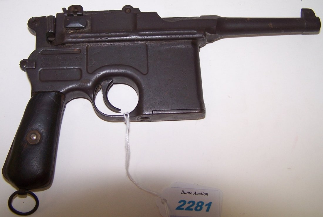 *BROOM HANDLE GERMAN MAUSER PISTOL: S/N: 697299, 7.65mm caliber, 3 3/4" barrel, with wood grips (Waiting Period: 72 hours or Curio license).