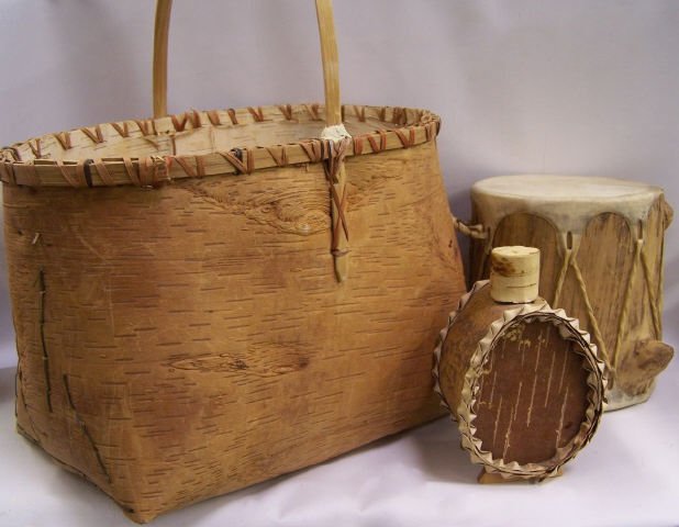 *3 SOUTHWEST PIECES: Birch bark basket with single handle, tree stump drum and birch tree decanter, approximate diameter of longest 16 1/2".