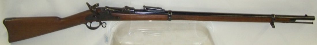 *REPRO U.S. SPRINGFIELD MODEL 1884 TRAP DOOR RIFLE: S/N: 486590, .45-70 caliber, 30" barrel, blued finish with smooth walnut stock (Waiting Period: 24 hours).