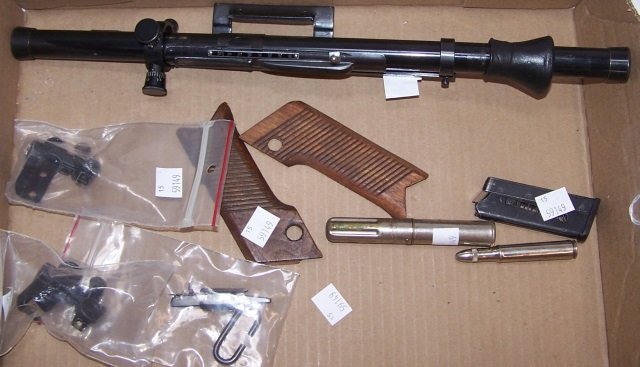 GROUP: 2 rifle peep sights by Mossberg #4, 1 BB rifle peep sight, unmarked, 1 .22 rifle scope by Wards, 1 set of wood pistol grips and 1 metal oiler.