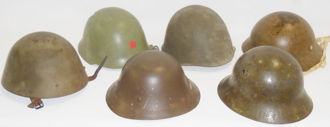*GROUP OF 6 FOREIGN MILITARY HELMETS: *GROUP OF 6 FOREIGN MILITARY HELMETS