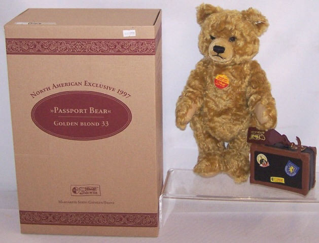 *STEIFF BEAR: Passport bear 1997, bear with suitcase, growler, approximate height 13", with original box.