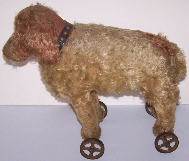 *EARLY STUFFED TOY DOG ON WHEELS (1 of 7)