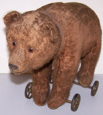 *EARLY STUFFED TOY BEAR ON WHEELS (1 of 6)